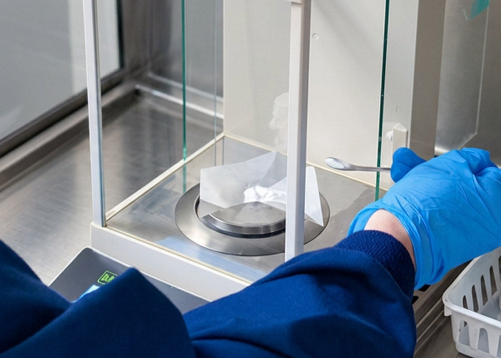 Compounding ingredients weighed on a precision balance